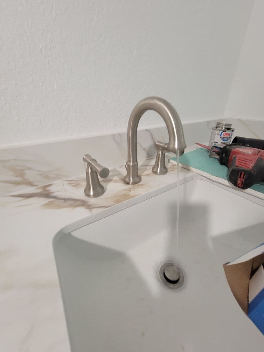 Sleek Sink and Modern Chrome Faucet Installation